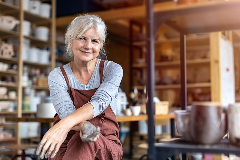 Portrait of senior female pottery artist